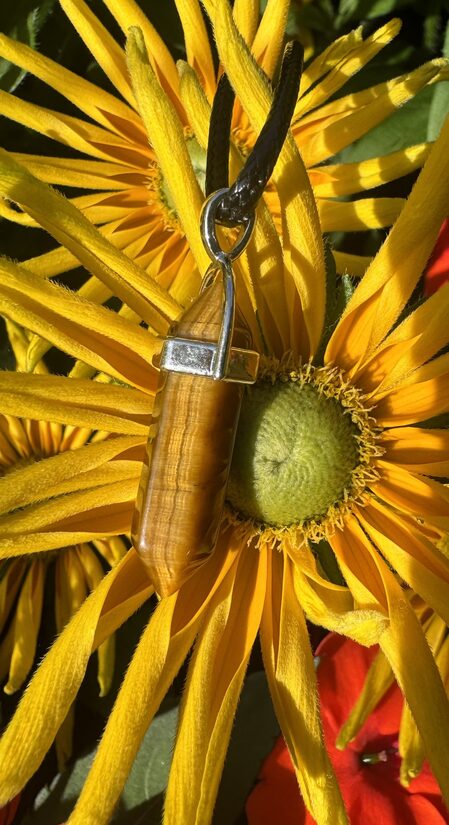 Tīģeracs kuloniņš tornītis